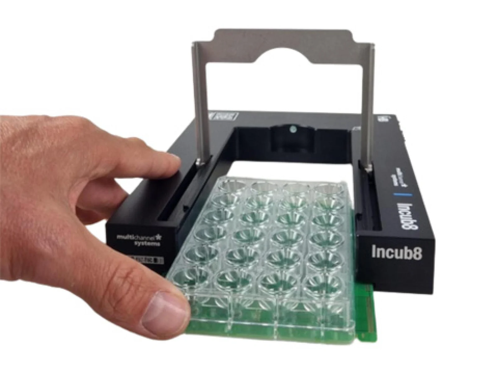 A hand slides a clear 24-well plate into a black recording station labelled Incub8